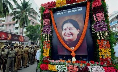 Tamil Nadu govt appoints retired judge to probe Jayalalithaa's death Security men guard during an AIADMK rally to pay tribute J Jayalalithaa in Coimbatore. Photo: PTI