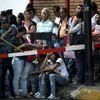 Desperate to dump soon-worthless cash, Venezuelans flock to banks