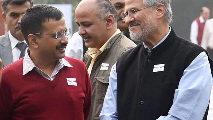 Delhi Chief Minister Arvind Kejriwal talks to former Lt Governor Najeeb Jung. Photo: PTI Delhi Chief Minister Arvind Kejriwal talks to former Lt Governor Najeeb Jung. Photo: PTI
