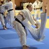 Russian President Vladimir Putin competes against Mikhail Pulyaev, member of Russian national judo team during Russia's national Judo team training session in the resort city of Sochi, Russia.