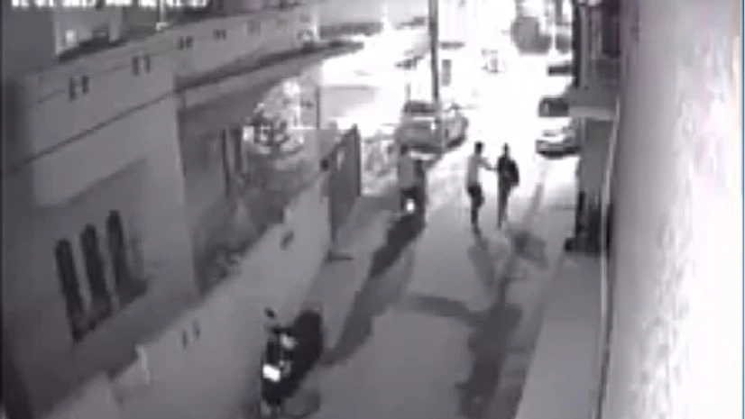 Two men molesting women in a street Molestation, Bangaluru