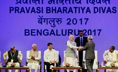 Convert PIO cards to OCI cards: PM to overseas Indians Prime Minister Narendra Modi greets his Portuguese counterpart António Costa as Suriname Vice President Michael Ashwin Adhin, Karnataka Governor Rudabhai Vajubhai Vala, Chief Minister Siddaramaiah, Minister of State for External Affairs V K Singh and