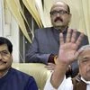 SP supremo Mulayam Singh Yadav with party leaders Amar Singh and Shivpal Yadav
