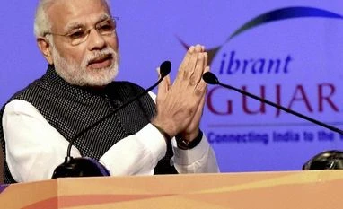 PM Modi's photos at petrol pumps violate model code: EC Narendra Modi