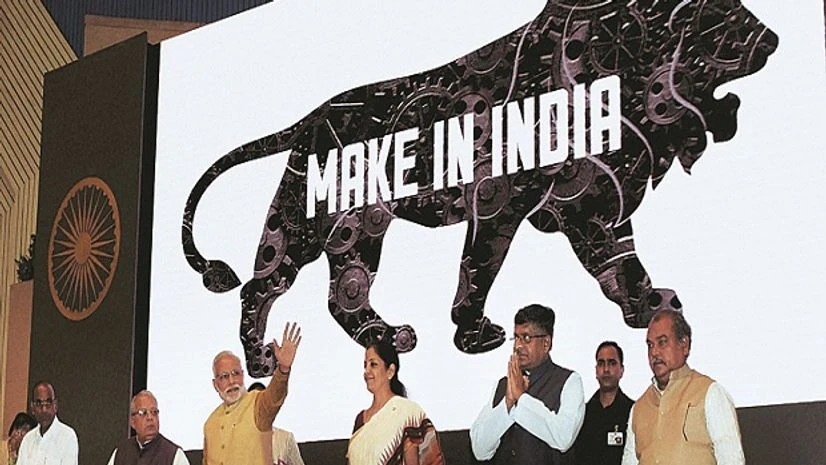make in india LITTLE PROGRESS: Prime Minister Narendra Modi with members of his cabinet at the launch of Make in India in 2014. For all the hoopla, there is precious little to show for the initiative. Prospects for manufacturing growth are not rosy