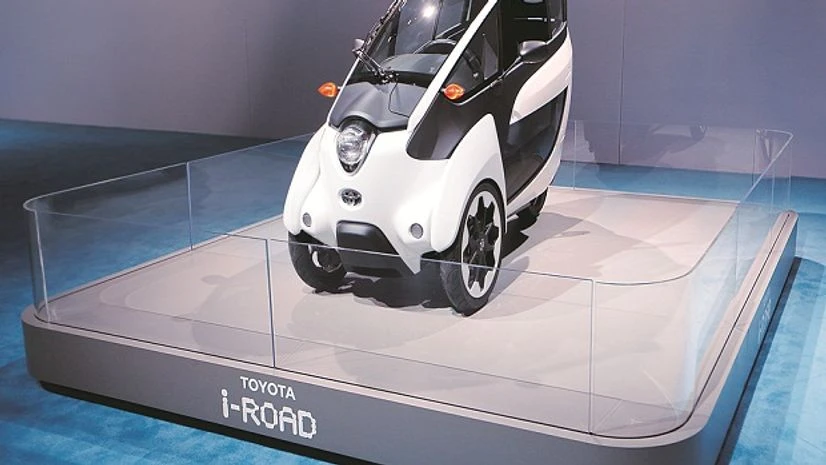 A Toyota i-Road three wheeled vehicle Toyota i-Road, Toyota, electric vehicles