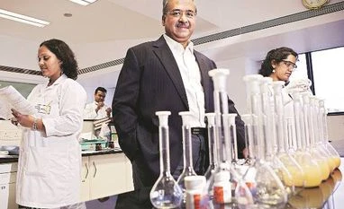 USFDA accepts Sun Pharma's new eye drug application Sun Pharmaceutical Managing Director Dilip Shanghvi (centre)