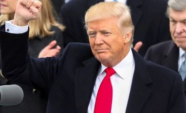 White House blocks CNN, NYT, LA Times, others from media briefing President Trump: A clenched fist for day 1