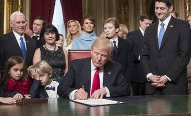 Indo-US ties headed for new era under Trump: Indian-American supporters President Donald Trump is joined by the Congressional leadership and his family as he formally signs his cabinet nominations into law