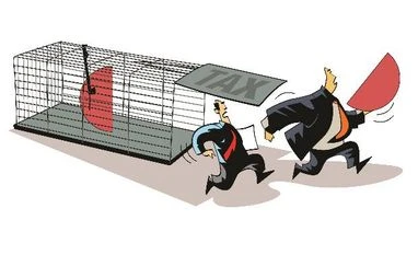 I-T begins action under Benami Act; attaches 42 assets worth crores Tax