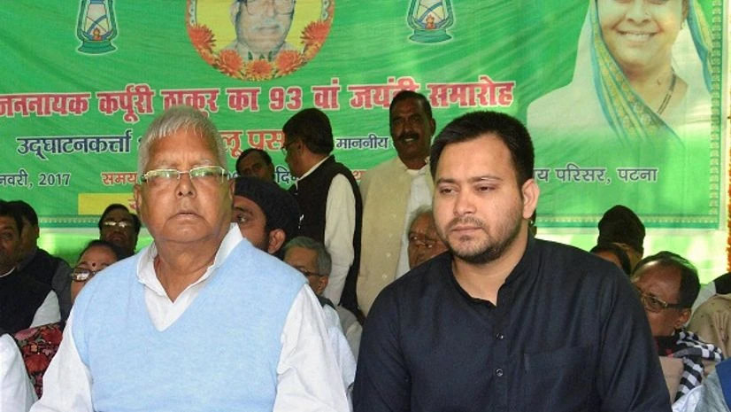 RJD Chief Lalu Prasad Yadav with Bihar Deputy Chief Minister Tejashwi Yadav during the 93rd birth anniversary celebrations of Jannayak Karpoori Thakur Lalu Prasad Yadav, Tejashwi Yadav