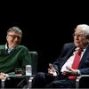 Warren Buffett, chairman and CEO of Berkshire Hathaway, speaks while Bill Gates looks on at Columbia University in New York