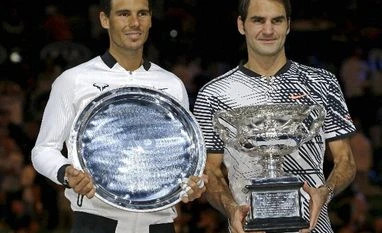 Federer-Nadal to reprise Aus Open title clash at Indian Wells Masters Switzerland's Roger Federer, right, and Spain's Rafael Nadal hold their trophies after Federer won their men's singles final at the Australian Open tennis championships in Melbourne, Australia.