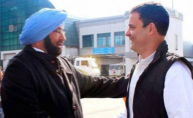 Eyeing 'better Punjab', NRIs bat for Congress Congress Punjab CM candidate Captain Amarinder Singh with party Vice President Rahul Gandhi. Photo: PTI