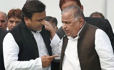 Mulayam Singh Yadav has unpaid electricity bill worth Rs 4 lakh: SDO Uttar Pradesh Chief Minister Akhilesh Yadav with SP veteran Mulayam Singh Yadav. Photo: PTI