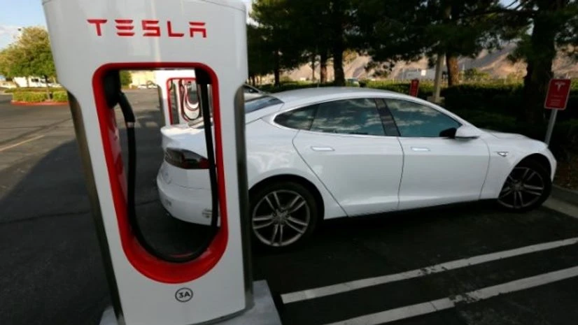 A Tesla Model S charges at a Tesla Supercharger station in Cabazon, California. Photo: Reuters A Tesla Model S charges at a Tesla Supercharger station in Cabazon, California. Photo: Reuters