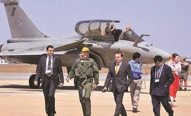 Global aerospace firms use tie-ups to tap India market Reliance Group Chairman Anil Ambani leaves with his team after flying the Rafale aircraft during the second day of the 11th biennial edition of AeroIndia 2017 at Yelahanka Air base in Bengaluru on Wednesday