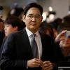 After night in cell, Samsung scion taken for questioning