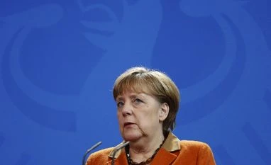 Merkel warns countries not to go it alone, solve global issues together angela merkel, merkel