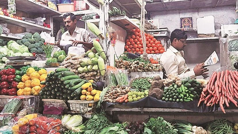 Vendors at a vegetable market in Mumbai. In recent weeks, the perception of households of their future prospects has been less optimistic that regarding their current economic conditions Photo: Reuters Consumer Life, Mahesh Vyas, Consumer Sentiment, Unemployment