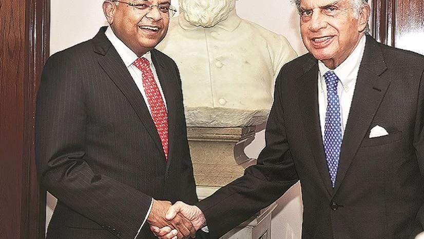 Chandra takes charge: New Tata Sons Chairman N Chandrasekaran with Ratan Tata at Bombay House. The latter quit the board on Tuesday. Chandra takes charge: New Tata Sons Chairman N Chandrasekaran with Ratan Tata at Bombay House. The latter quit the board on Tuesday.