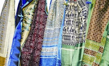 Titan goes the whole six yards Titan sarees