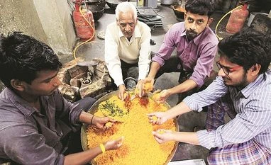 UP elections 2017: Rahul rejects exit poll results UP election, Laddu