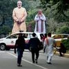 Giant cut-outs of Prime Minister Narendra Modi and BJP President Amit Shah fixed at the party headquarters