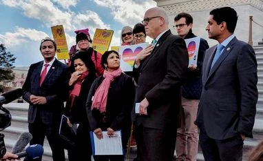 Two in five Indian-Americans worried about financial stability: Survey Indian-Americans holding an awareness rally outside White House