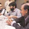 (From left) Revenue Secretary Hasmukh Adhia interacts with Eicher CEO Siddhartha Lal and Marico chief Harsh Mariwala