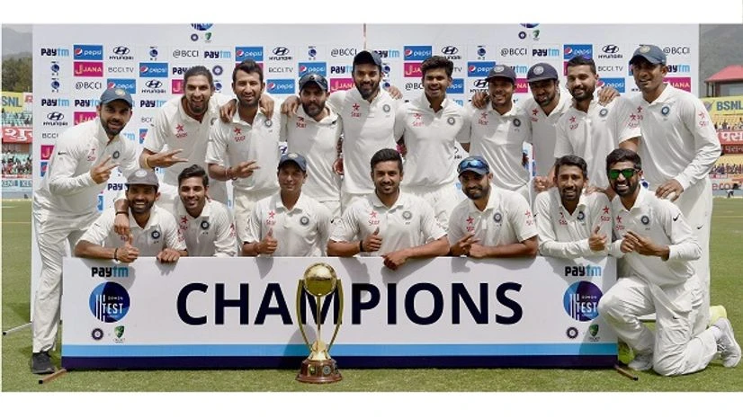Team India with the Border-Gavaskar Trophy after beating Australia by eight wickets in the deciding fourth Test at HPCA Stadium in Dharamsala India vs Australia, Match, Team India