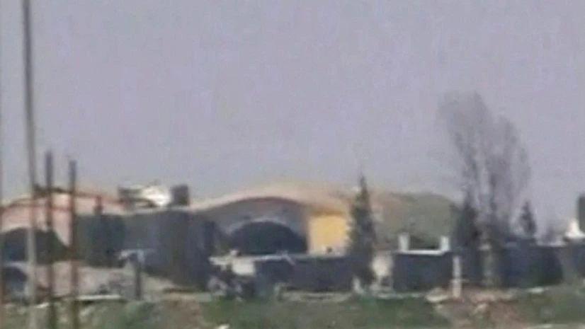 This frame grab from video provided by the Syrian official TV, a Syrian government channel that is consistent with independent AP reporting, shows the burned and damaged hangar warplanes which attacked by U.S. Tomahawk missiles, at the Shayrat Syrian This frame grab from video provided by the Syrian official TV, a Syrian government channel that is consistent with independent AP reporting, shows the burned and damaged hangar warplanes which attacked by U.S. Tomahawk missiles, at the Shayrat Syrian