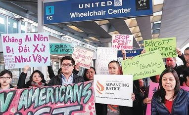 Man dragged off plane: United Airlines changes crew policy to avoid mishap Community members protest the treatment of David Dao, who was forcibly removed from a United Airlines flight on Sunday by the Chicago Aviation Police, at O'Hare International Airport in Chicago. Photo: Reuters