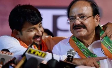1,790 candidates lose deposit in MCD polls Union Minister M Venkaiah Naidu (R) and Delhi BJP President Manoj Tiwari (L) during a press conference after registering a huge victory in the MCD elections in New Delhi on Wednesday. (Photo: PTI)