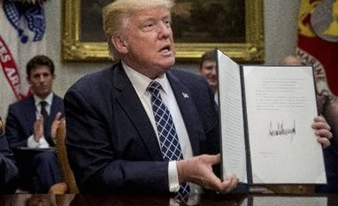 Donald Trump steps back from brink of killing North American trade pact Donald Trump