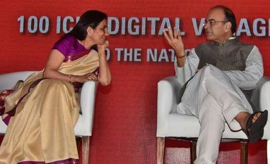 ICICI makes 100 villages digitally-enabled; targets 500 more by 2017 Minister of Finance Arun Jaitley and Chanda Kochhar, MD & CEO, ICICI Bank at the Inauguration of '100 ICICI Digital Villages'. Photo: Sanjay K Sharma