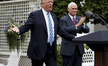 Donald Trump, Vladimir Putin discuss steps to ease Syria's civil war Donald Trump, Mike Pence