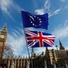 UN and Union flags fly above Parliament Square in London