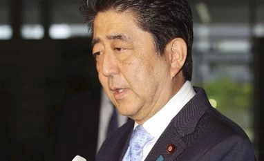 Now, travel without surge pricing with new app-based cab services Shinzo Abe