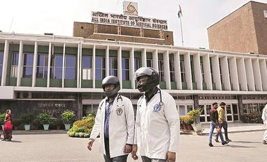 Staff shortage: AIIMS discontinues contact tracing of exposed workers In March, several doctors at AIIMS, New Delhi, took to wearing helmets during a protest against the violence. Photo: Dalip Kumar