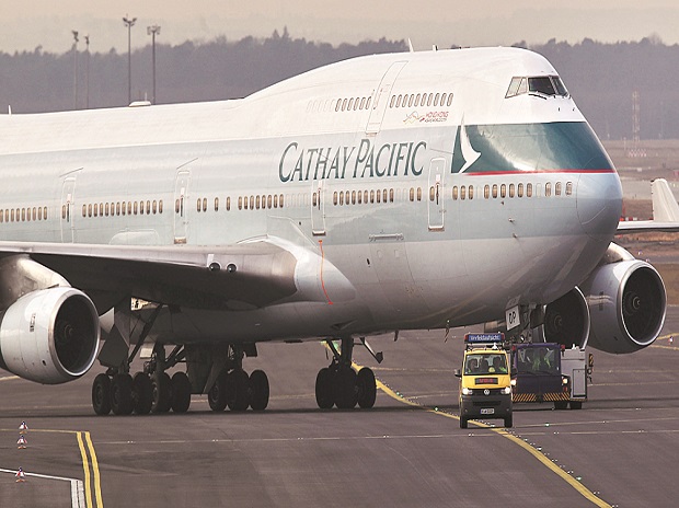 Cathay Pacific narrows annual loss on cost cuts and strong cargo demand