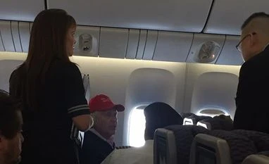 Passenger in Trump cap denied upgrade; disrupts, delays flight by 8 hours Photo Courtesy: Clark Gredona Facebook account