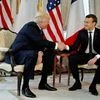 US President Donald Trump shakes hand with French President Emmanuel Macron. Photo: Reuters