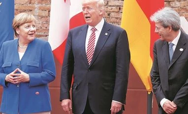 You're on your own: Donald Trump ditches EU and US' global leadership Nato, US President, Donald Trump, Angela Merkel, Paolo Gentiloni