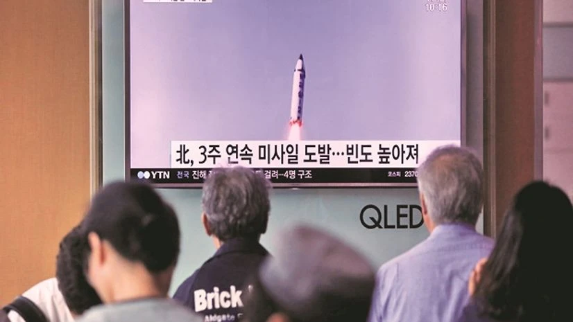 People at a railway station in Seoul, South Korea, watch a news report on North Korea firing what appeared to be a short-range ballistic missile. File Photo: Reuters People at a railway station in Seoul, South Korea, watch a news report on North Korea firing what appeared to be a short-range ballistic missile. File Photo: Reuters