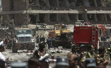 Kabul attack: Death toll reaches 90 Security forces are seen in front of the German Embassy after a suicide attack in Kabul (Photo: AP/PTI)