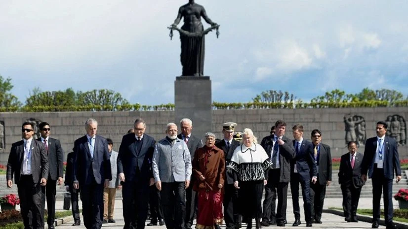 Prime Minister Narendra Modi at the Piskarovskoye Memorial Cemetery, in St Petersburg, Russia on Thursday. (Photo: PTI) Prime Minister Narendra Modi at the Piskarovskoye Memorial Cemetery, in St Petersburg, Russia on Thursday. (Photo: PTI)