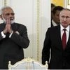 India's Prime Minister Narendra Modi, left, and Russian President Vladimir Putin arrives to attend a meeting with businessmen at the St. Petersburg International Economic Forum in St. Petersburg, Russia, Thursday, June 1, 2017. Modi's visit to Russia