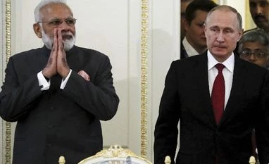 Modi invites Russian firms to invest in defence, other sectors India's Prime Minister Narendra Modi, left, and Russian President Vladimir Putin arrives to attend a meeting with businessmen at the St. Petersburg International Economic Forum in St. Petersburg, Russia, Thursday, June 1, 2017. Modi's visit to Russia