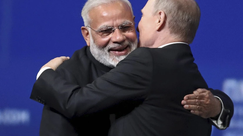 Russian President Vladimir Putin, right, and Indian Prime Minister Narendra Modi give each other a hug at the St. Petersburg International Economic Forum in St. Petersburg, Russia, Friday.(Photo: AP/PT) Russian President Vladimir Putin, right, and Indian Prime Minister Narendra Modi give each other a hug at the St. Petersburg International Economic Forum in St. Petersburg, Russia, Friday.(Photo: AP/PT)